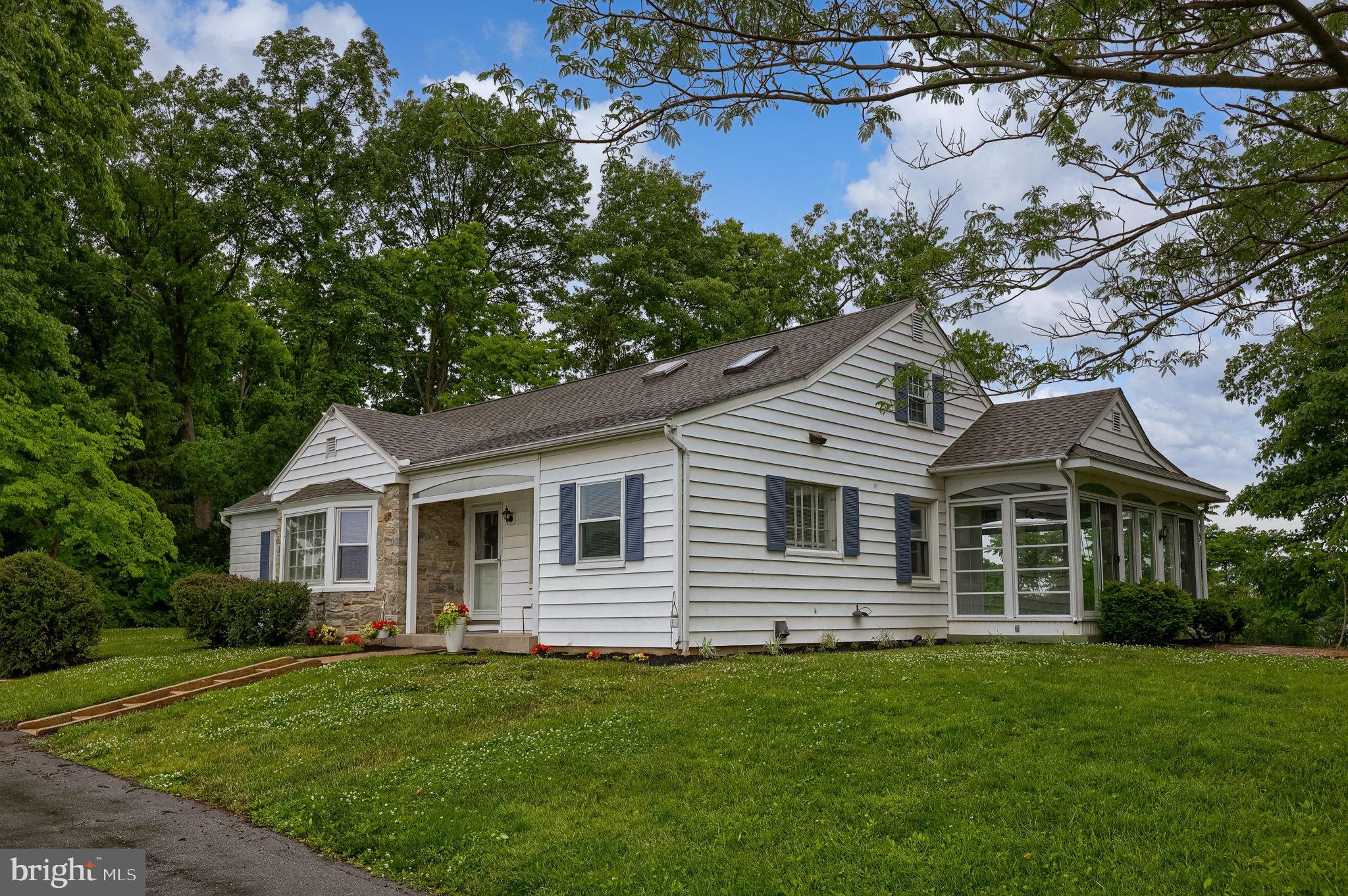 145 Weaver Road Lancaster, PA 17603 - Photo 10 of 87 a front view of a house with a garden