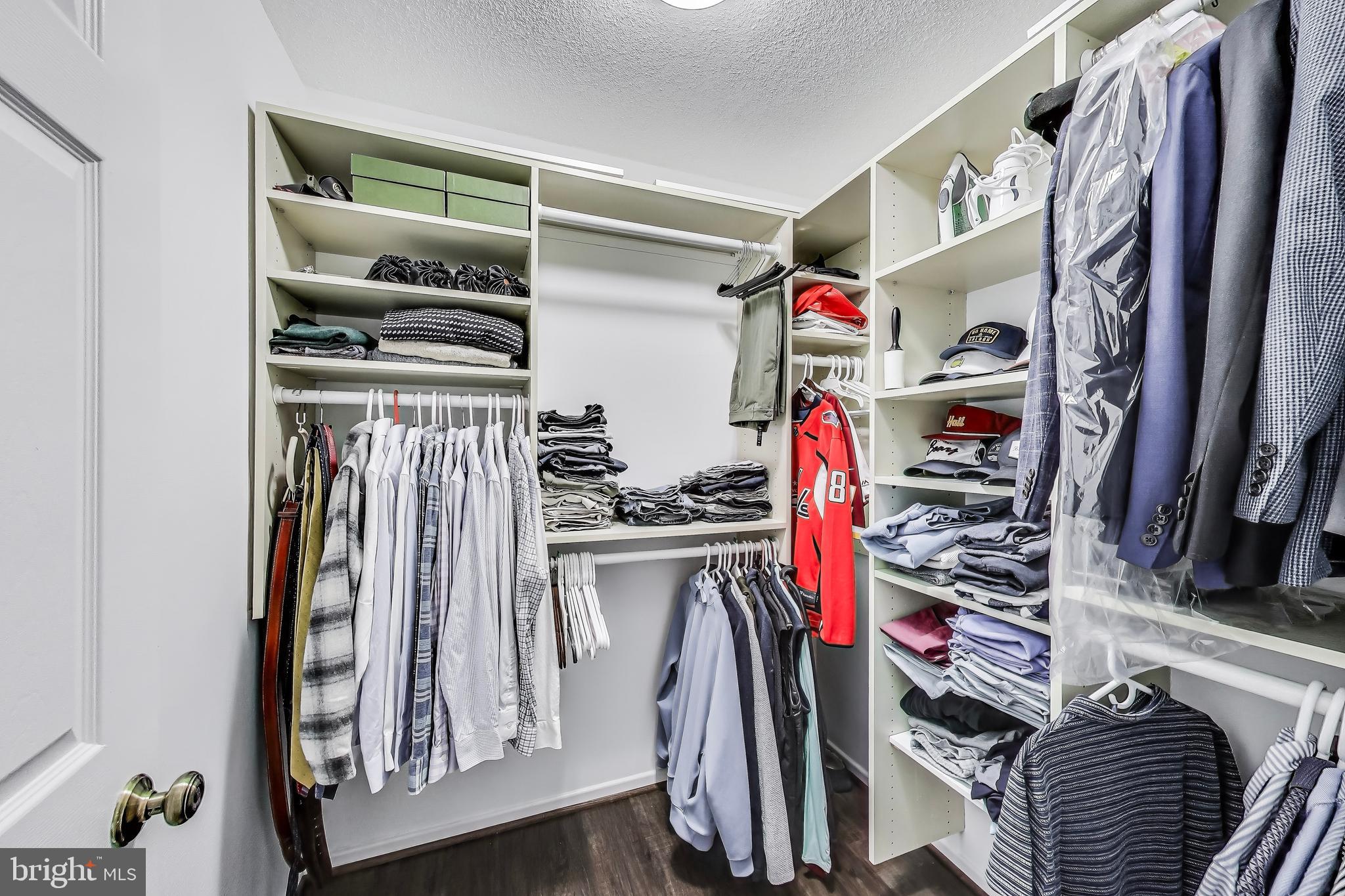 2111 Wisconsin Avenue Northwest, Unit 109 Washington, DC 20007 - Photo 24 of 50 a view of walk in closet with clothes and shoes