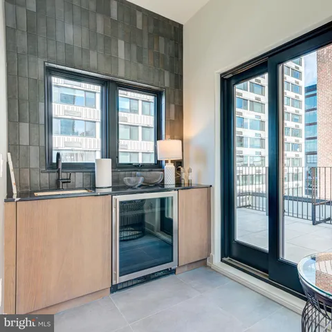 a view of balcony with furniture