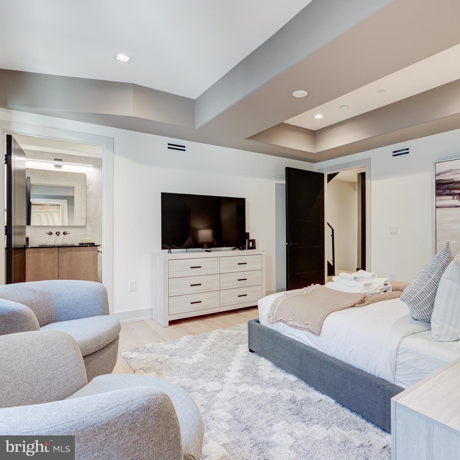 109 South 24th Street Philadelphia, PA 19103 - Photo 38 of 55 a living room with furniture and a flat screen tv