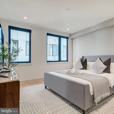 a bathroom with a shower and a toilet