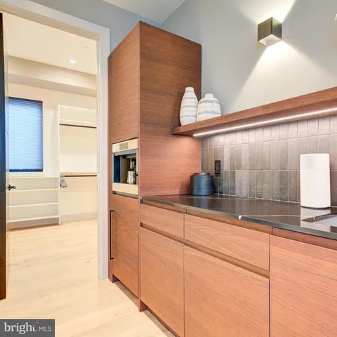 a front view of a building with a street