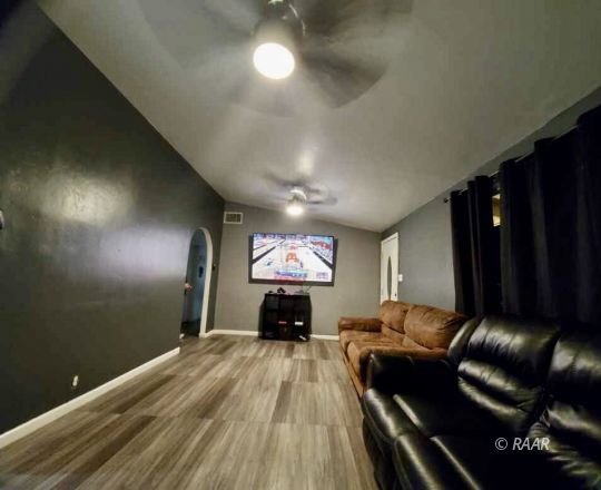 425 North Norma Street Ridgecrest, CA 93555 - Photo 3 of 33 a living room with furniture and a fireplace