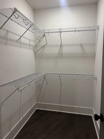 a view of a room with racks on the wall