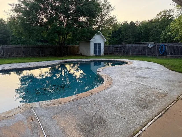 a view of backyard with green space
