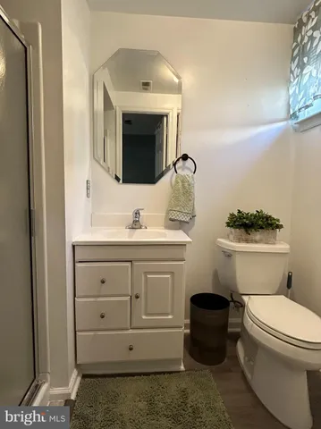 a bathroom with a sink and a washing machine