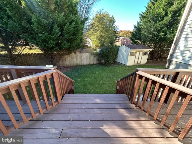 a patio with table and chairs