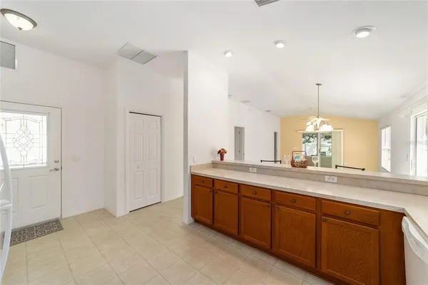 a spacious bathroom with a double vanity sink and a mirror