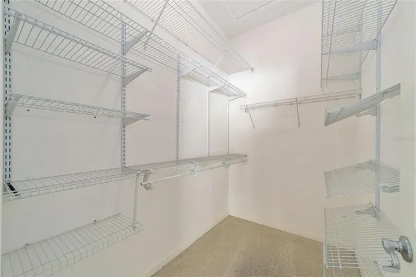 a view of a room with racks on the wall