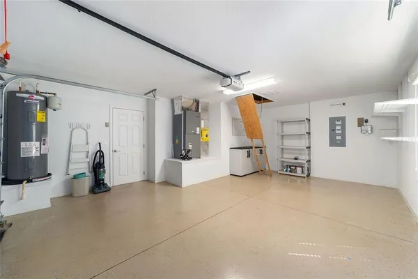 a view of a livingroom with entryway and furniture