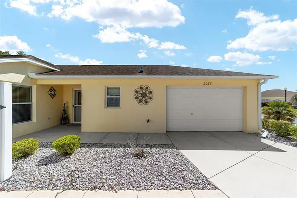 a view of a back yard of the house