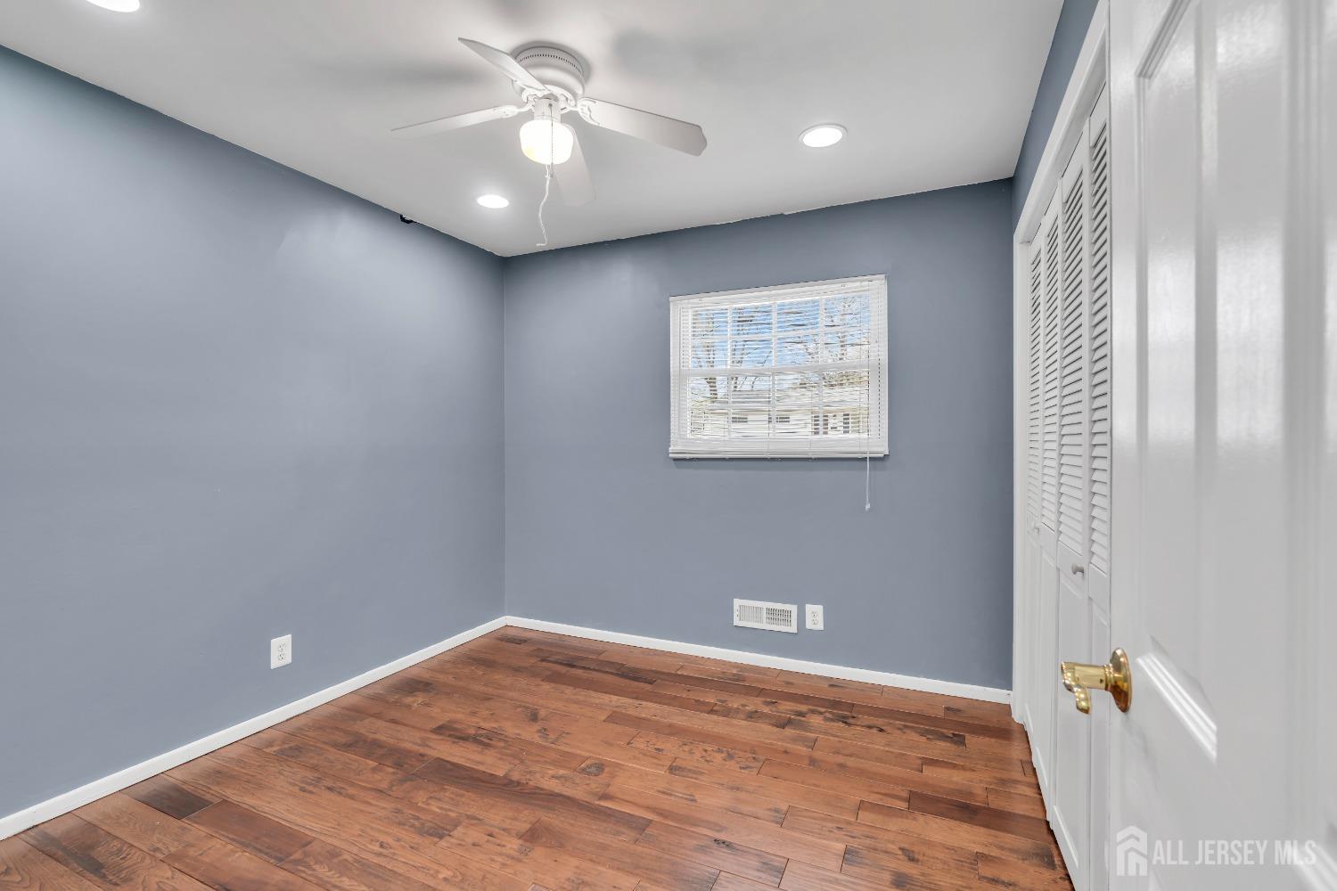 27 Brookside Road Edison, NJ 08817 - Photo 11 of 35 a view of an empty room with a window
