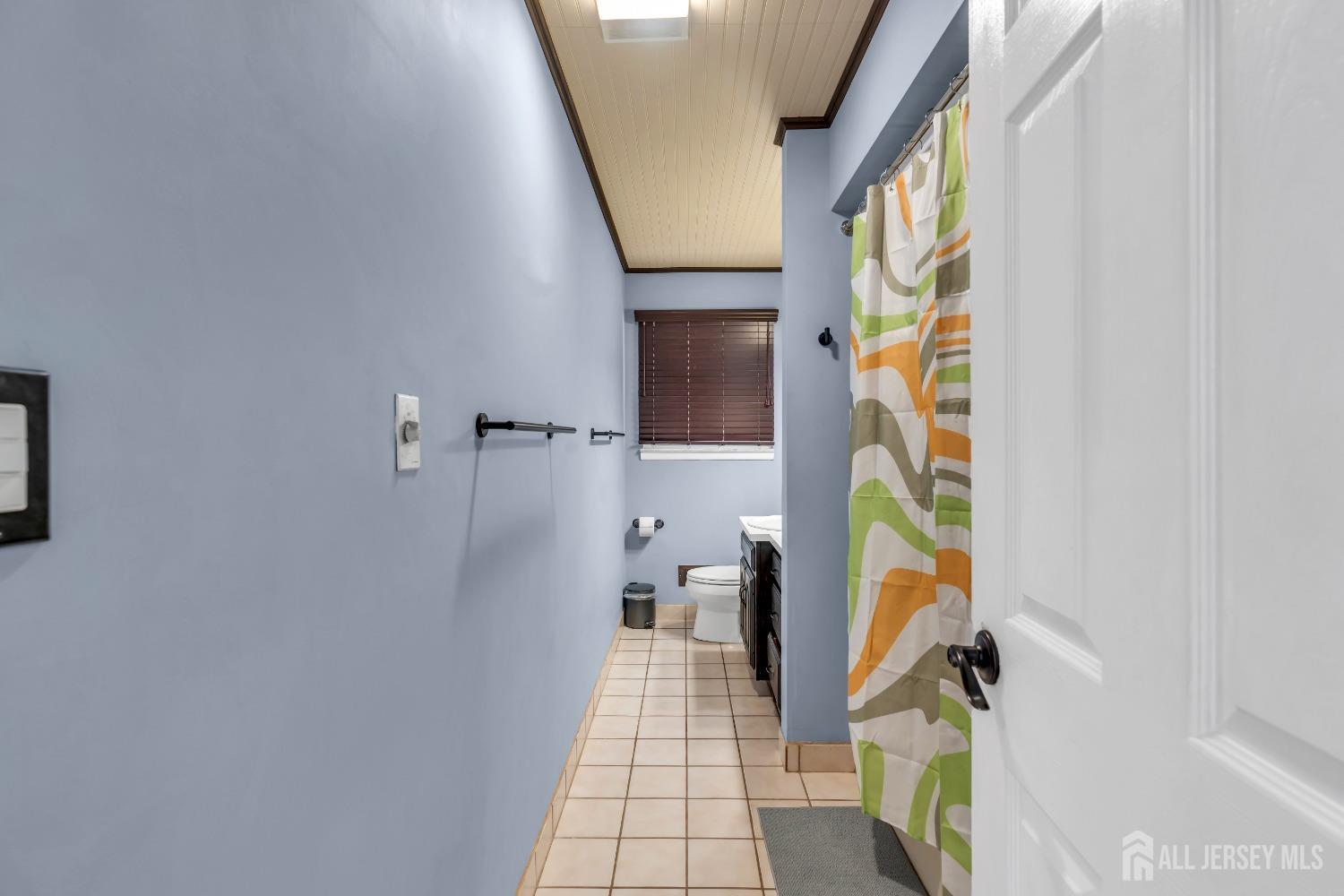 27 Brookside Road Edison, NJ 08817 - Photo 14 of 35 a bathroom with a shower