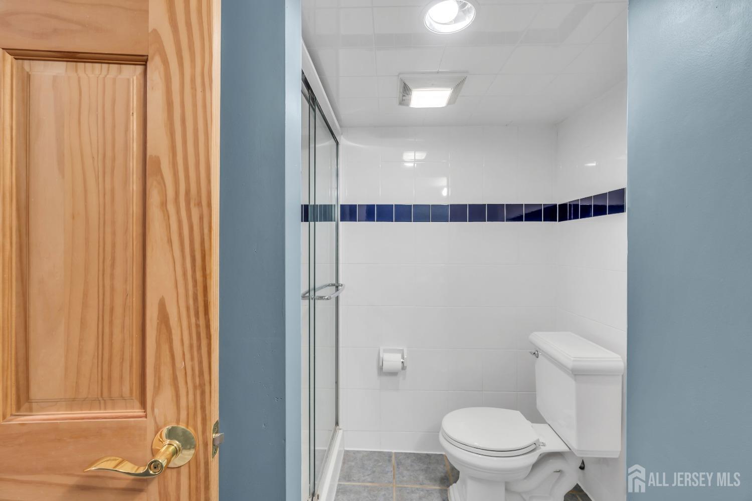 27 Brookside Road Edison, NJ 08817 - Photo 17 of 35 a bathroom with a toilet and a shower