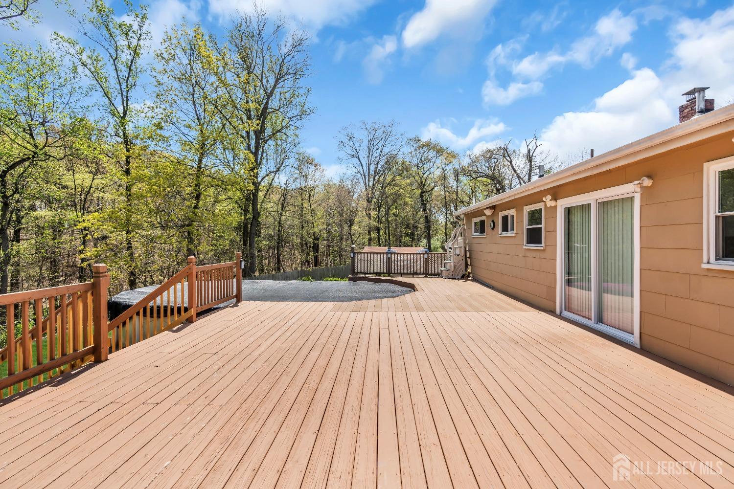 27 Brookside Road Edison, NJ 08817 - Photo 25 of 35 a view of a house with a roof deck