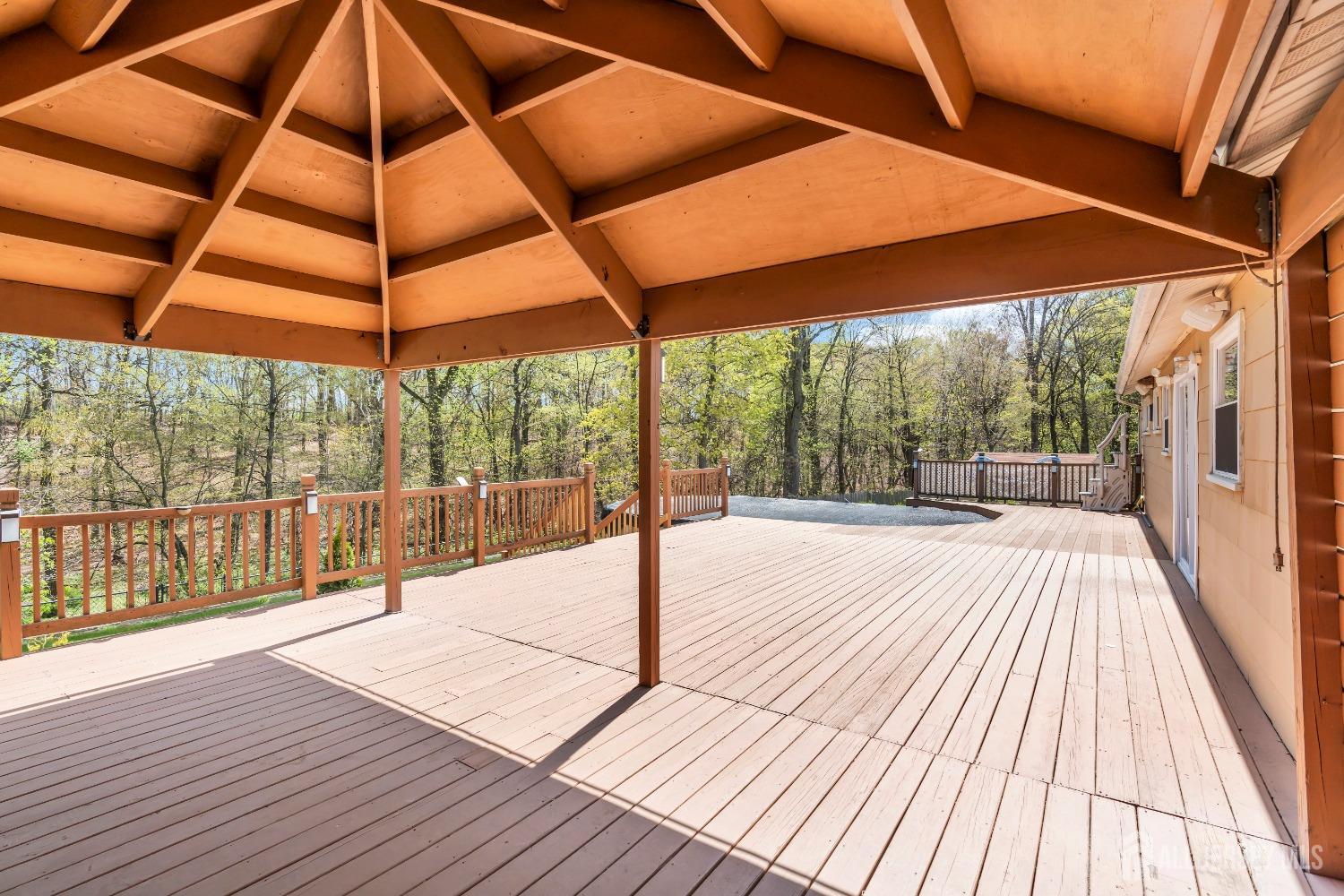 27 Brookside Road Edison, NJ 08817 - Photo 26 of 35 a view of a room with wooden floor and city view