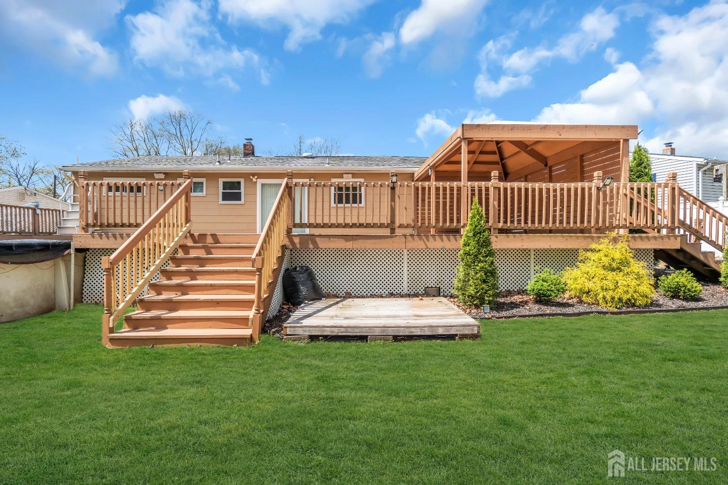 27 Brookside Road Edison, NJ 08817 - Photo 33 of 35 a view of a house with a yard