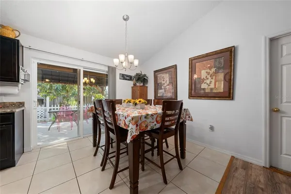 a kitchen with stainless steel appliances granite countertop a sink and a stove