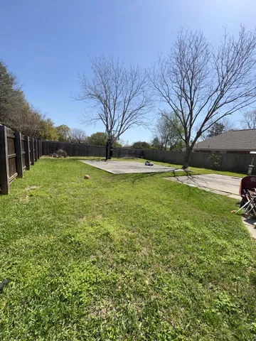 a view of pool in front of house