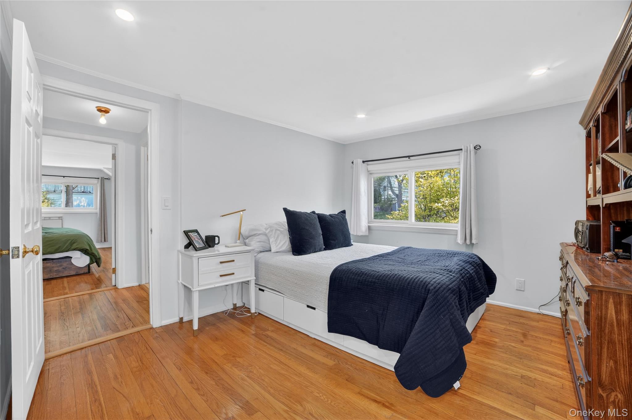 29 Newkirk Road Yonkers, NY 10710 - Photo 14 of 34 a bedroom with a bed and a window