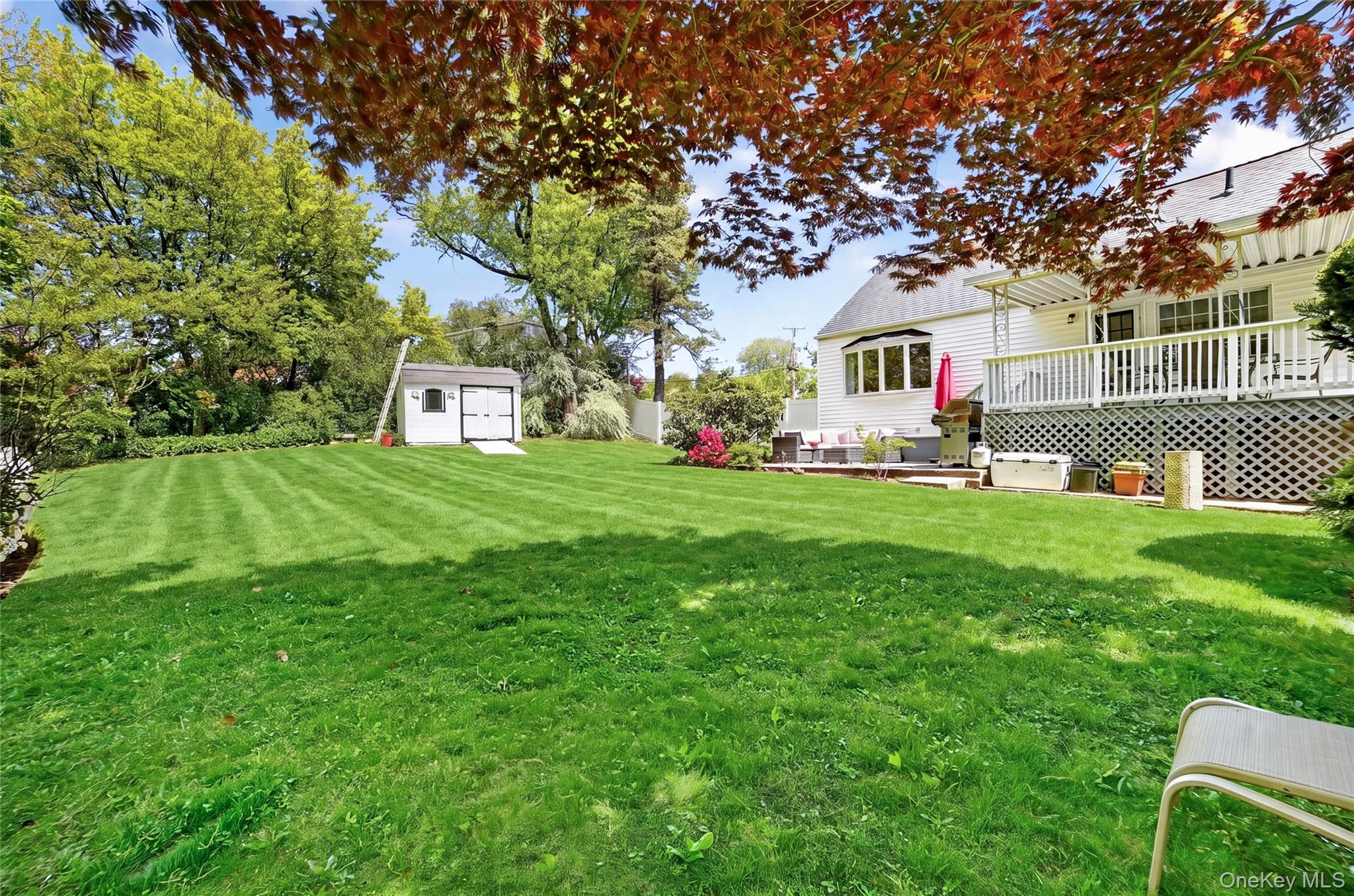 29 Newkirk Road Yonkers, NY 10710 - Photo 30 of 34 a house view with a sitting space and garden