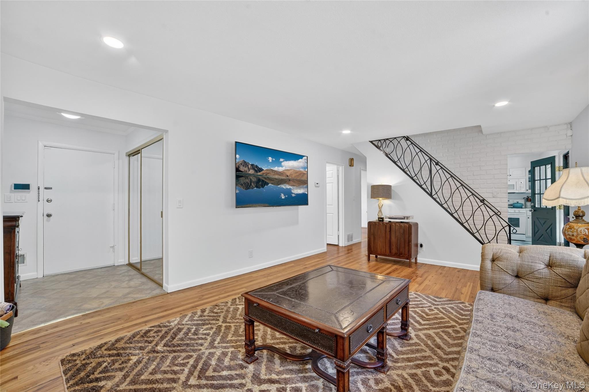 29 Newkirk Road Yonkers, NY 10710 - Photo 3 of 34 a living room with furniture and wooden floor