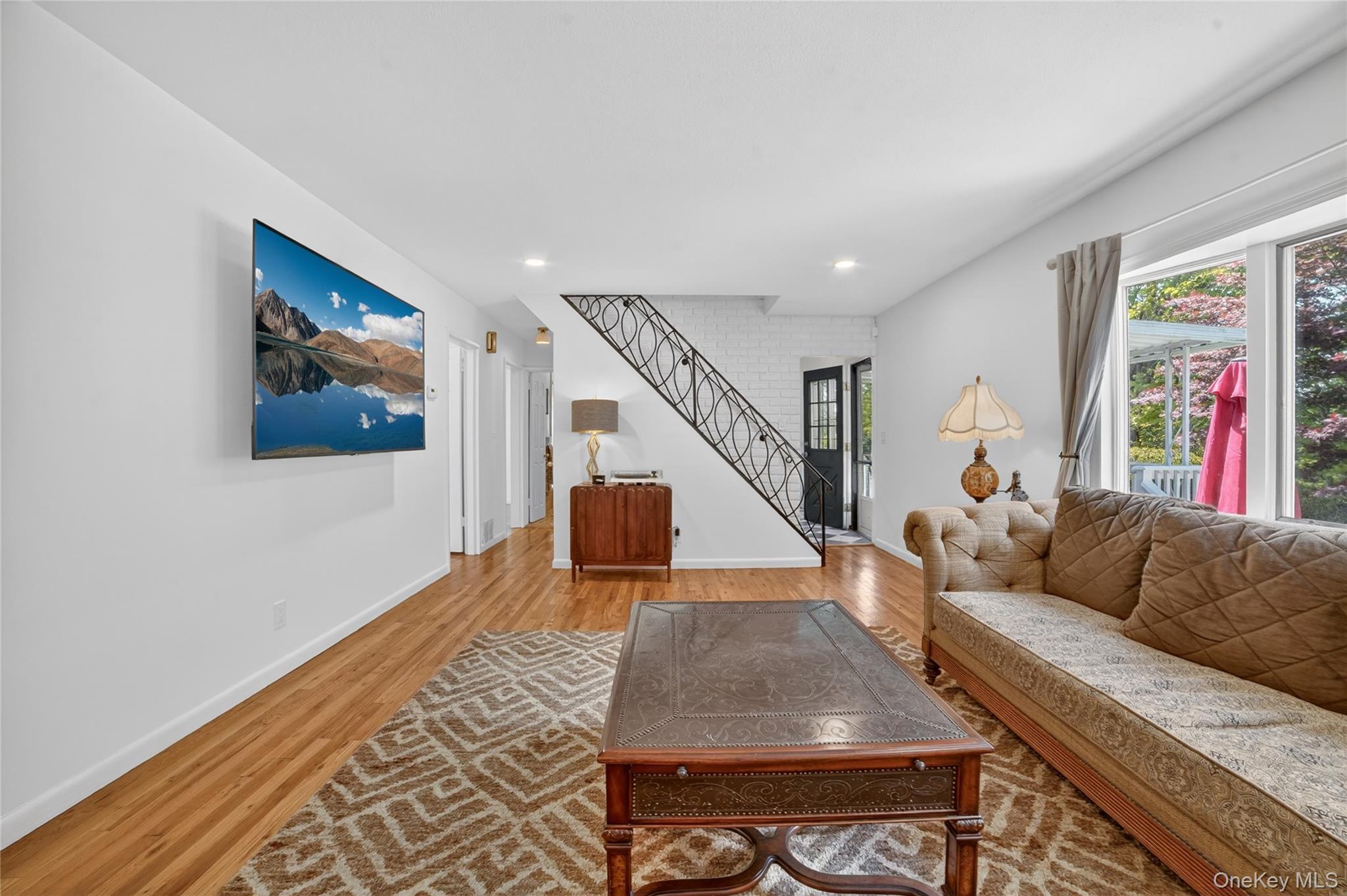 29 Newkirk Road Yonkers, NY 10710 - Photo 5 of 34 a living room with furniture and wooden floor