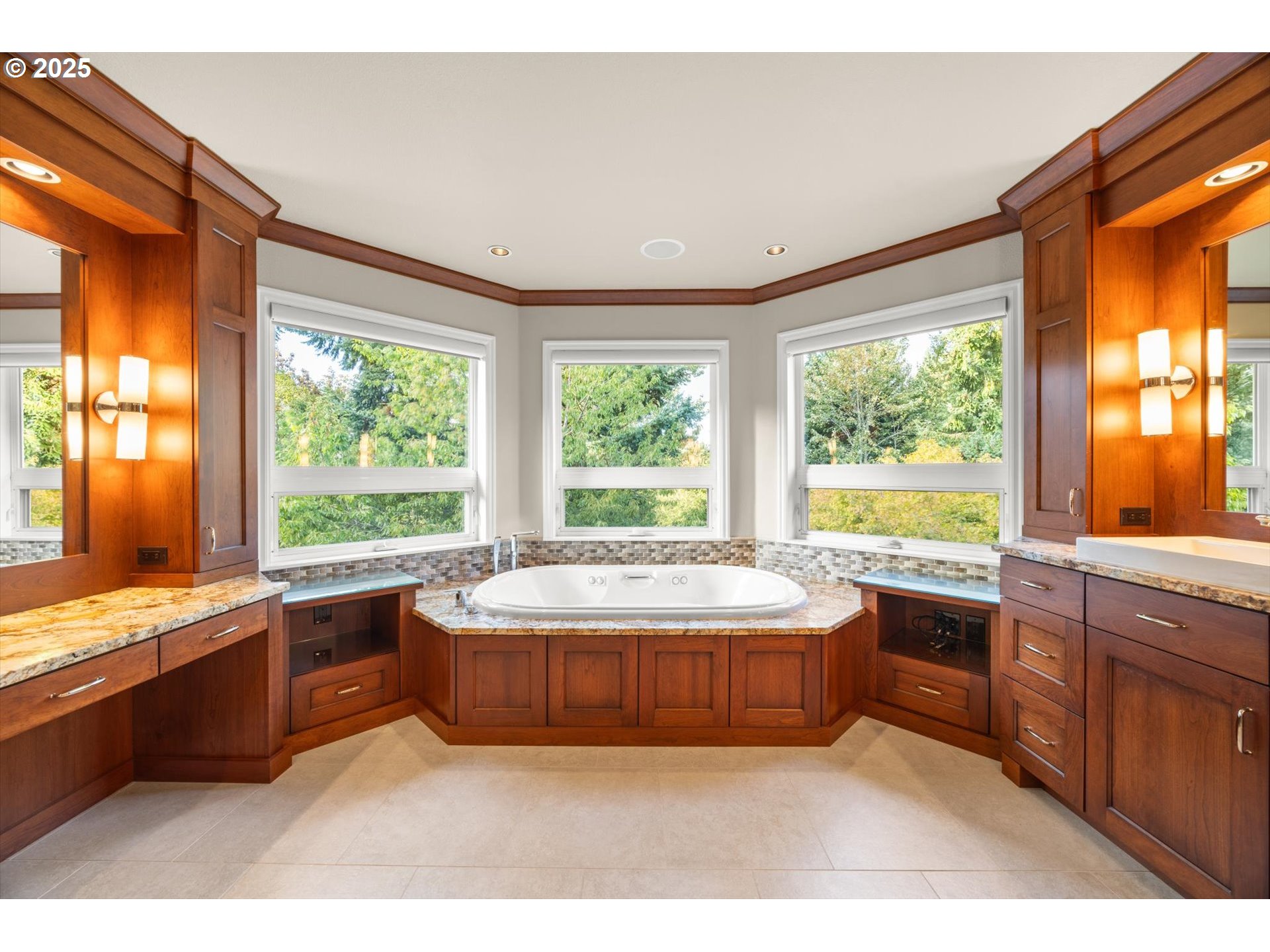 14014 Northwest 44th Court Vancouver, WA 98685 - Photo 18 of 47 a large white kitchen with granite countertop a stove a sink and a next to a window