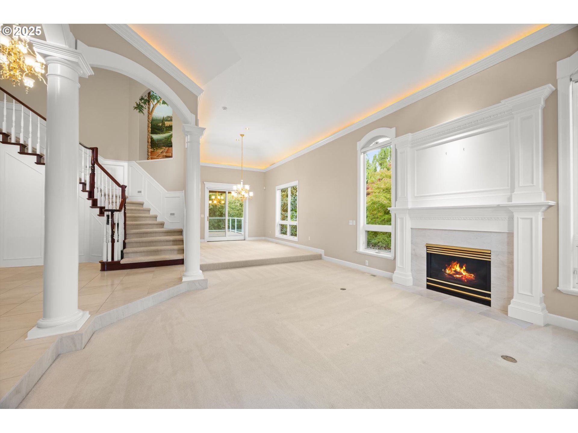 14014 Northwest 44th Court Vancouver, WA 98685 - Photo 6 of 47 a view of a livingroom with a fireplace stairs and windows