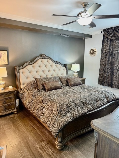 20 Rutledge Street, Unit 108 Nashville, TN 37210 - Photo 15 of 56 a large bed sitting in a bedroom next to a window