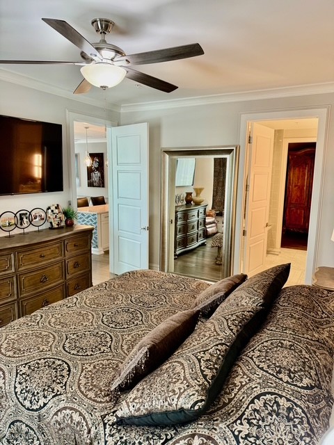 20 Rutledge Street, Unit 108 Nashville, TN 37210 - Photo 16 of 56 a bedroom with a bed and a flat screen tv