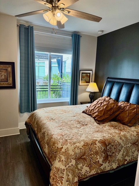 20 Rutledge Street, Unit 108 Nashville, TN 37210 - Photo 21 of 56 a bedroom with a bed and a window