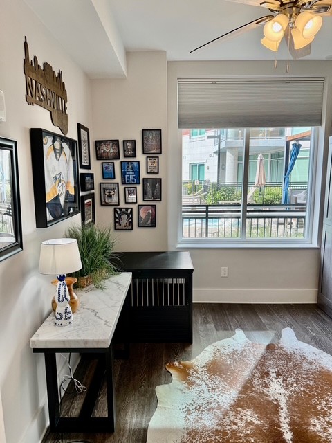 20 Rutledge Street, Unit 108 Nashville, TN 37210 - Photo 28 of 56 a living room with furniture and a window