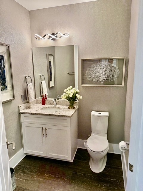 20 Rutledge Street, Unit 108 Nashville, TN 37210 - Photo 29 of 56 a bathroom with a toilet sink and mirror