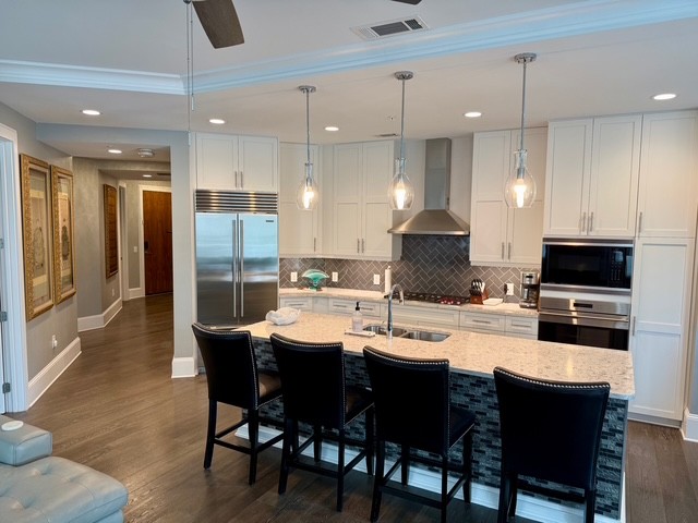 20 Rutledge Street, Unit 108 Nashville, TN 37210 - Photo 3 of 56 a large kitchen with a table and chairs