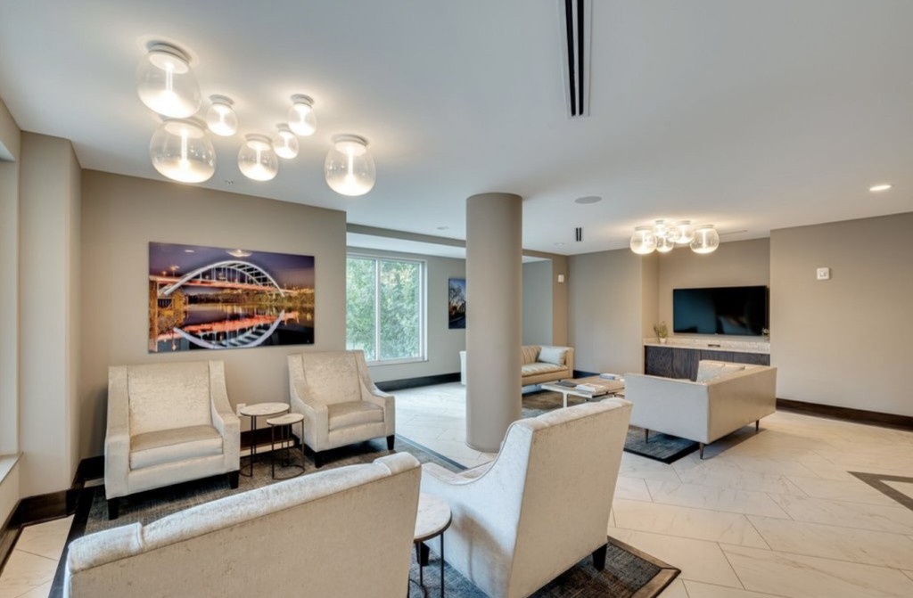 20 Rutledge Street, Unit 108 Nashville, TN 37210 - Photo 38 of 56 a living room with furniture and a flat screen tv