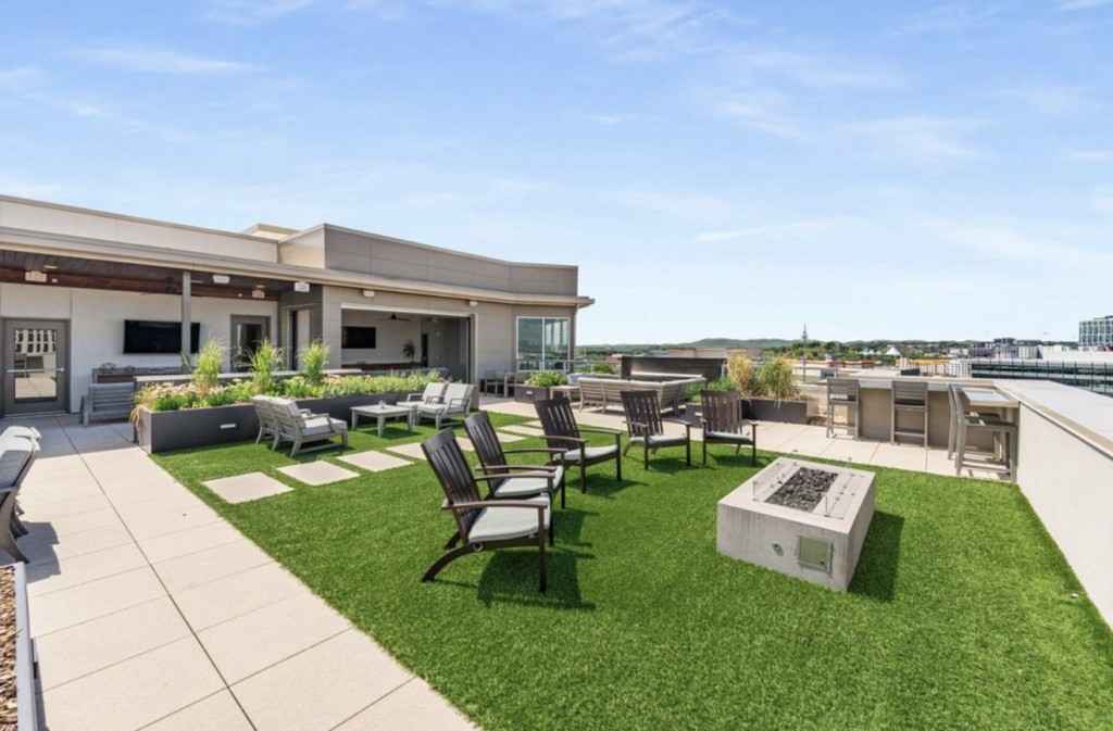 20 Rutledge Street, Unit 108 Nashville, TN 37210 - Photo 41 of 56 a view of a backyard with sitting area