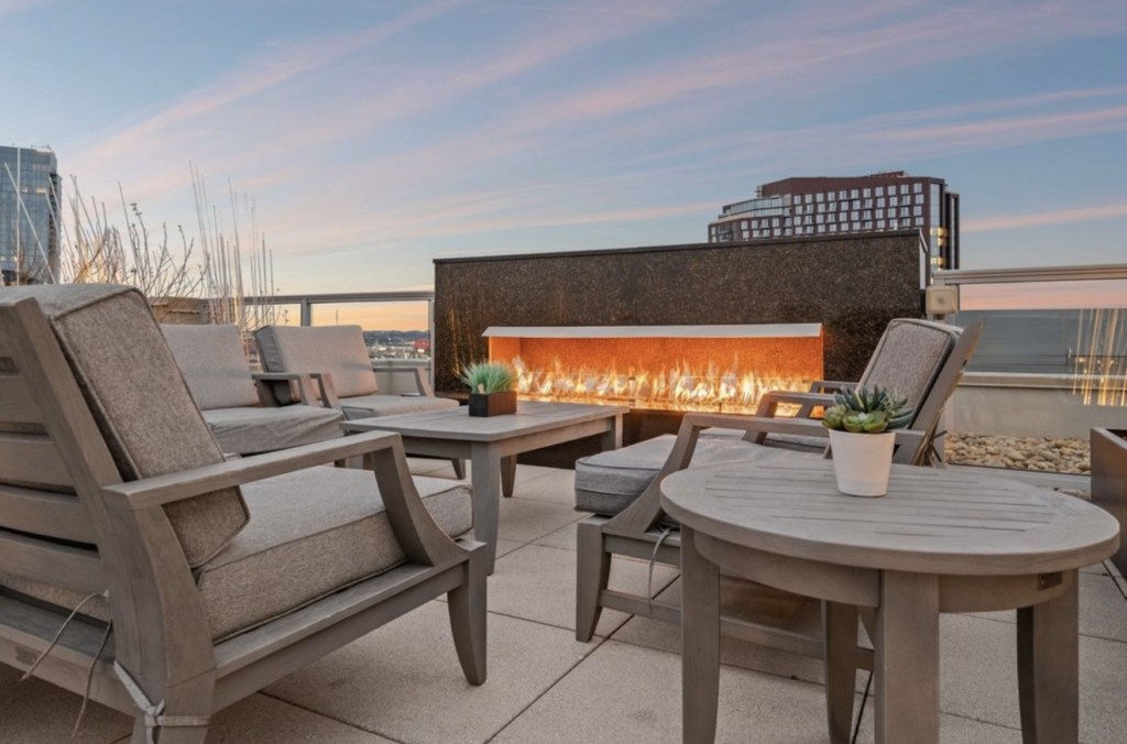 20 Rutledge Street, Unit 108 Nashville, TN 37210 - Photo 42 of 56 a view of a dining room with furniture and wooden floor