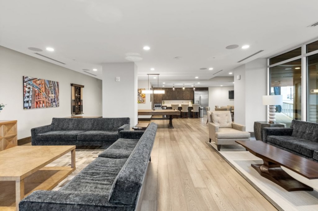 20 Rutledge Street, Unit 108 Nashville, TN 37210 - Photo 46 of 56 a living room with furniture and kitchen view