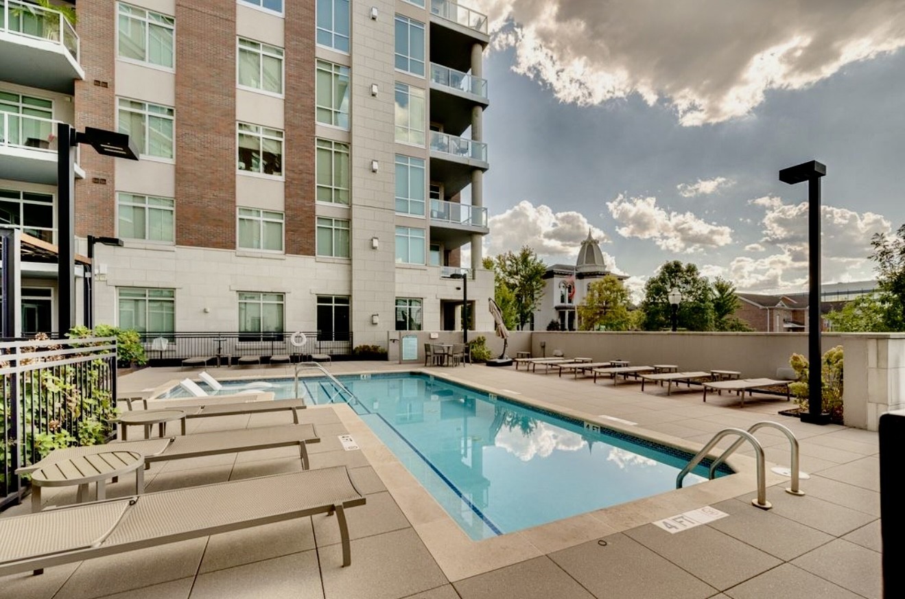 20 Rutledge Street, Unit 108 Nashville, TN 37210 - Photo 53 of 56 a view of a swimming pool with a lounge chairs