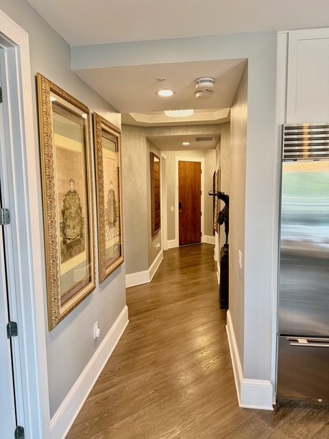 20 Rutledge Street, Unit 108 Nashville, TN 37210 - Photo 8 of 56 a view of a hallway with wooden floor and windows in a room