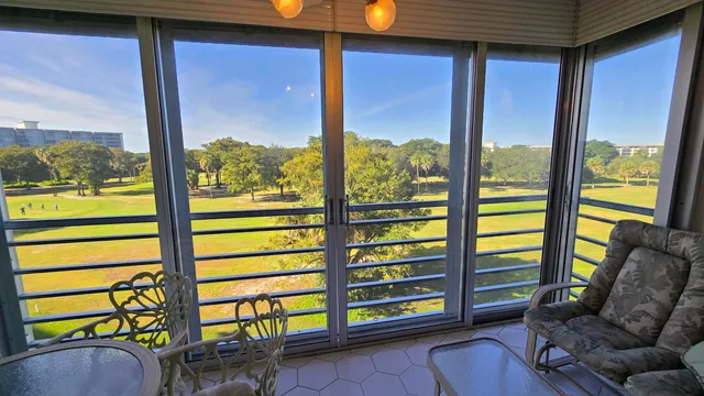 a view of a livingroom with furniture