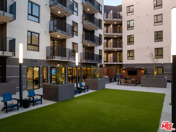 a view of a chairs and table in the kitchen