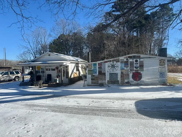 a view of street with small shops