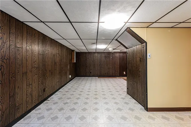 a view of a hallway with a glass door