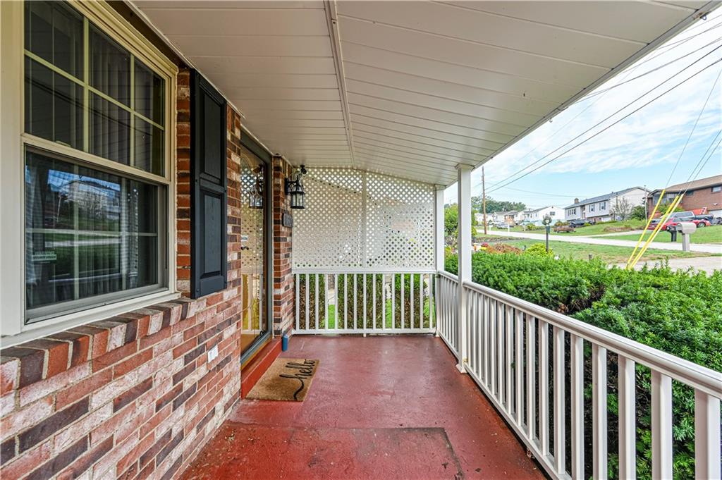 11320 James Street Irwin, PA 15642 - Photo 3 of 42 a view of a brick house with a large window