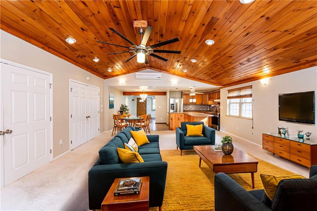 11320 James Street Irwin, PA 15642 - Photo 8 of 42 a living room with furniture and a flat screen tv