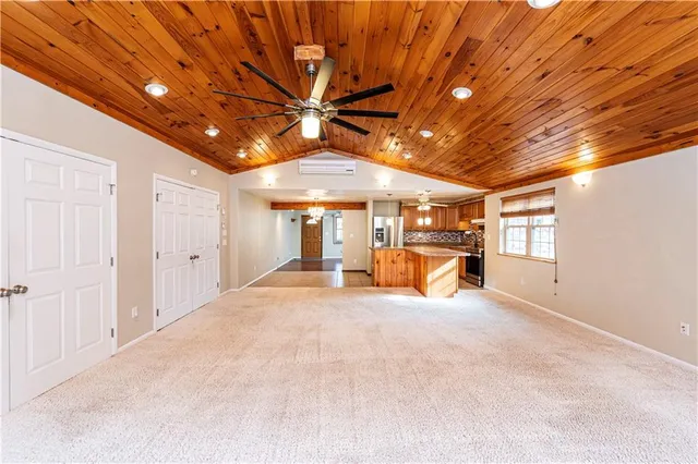 a view of a hall with wooden floor
