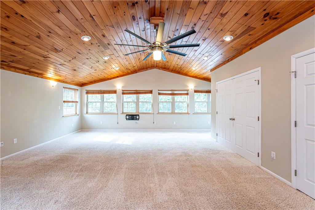 11320 James Street Irwin, PA 15642 - Photo 10 of 42 a big room with chandelier fan and windows