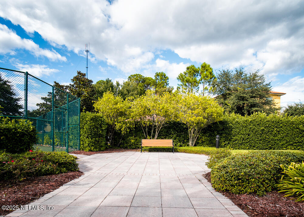9745 Touchton Road, Unit 1204 Jacksonville, FL 32246 - Photo 34 of 35 a front view of a house with a yard